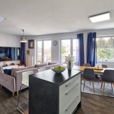 Prodej mezonetového bytu 4+kk s terasou, balkonem, garáží a parkovacím stáním v centru města